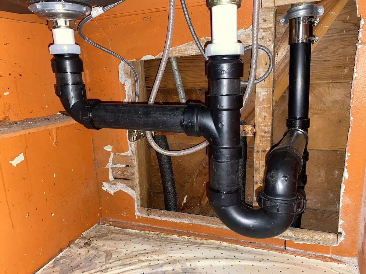 Professional Garbage Disposal Repair equipment and tools on the job in Cold Spring